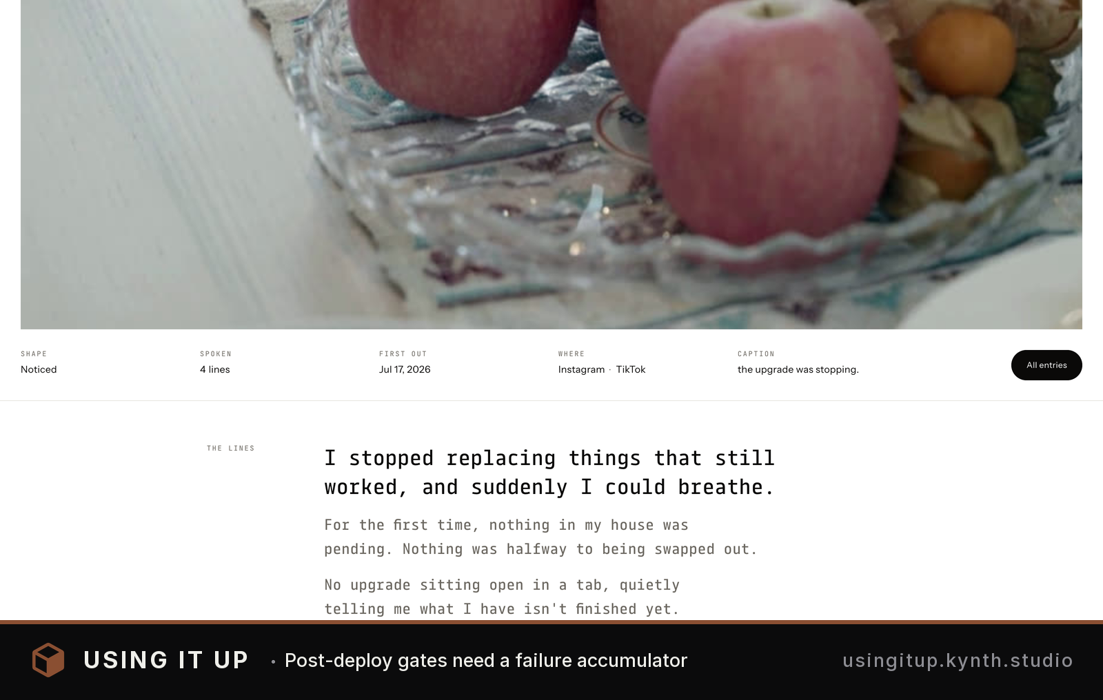 Apples in a bowl with a quote about stopping constant upgrades and accepting imperfection — Physical domestic scene grounds an abstract concept in tangible reality.